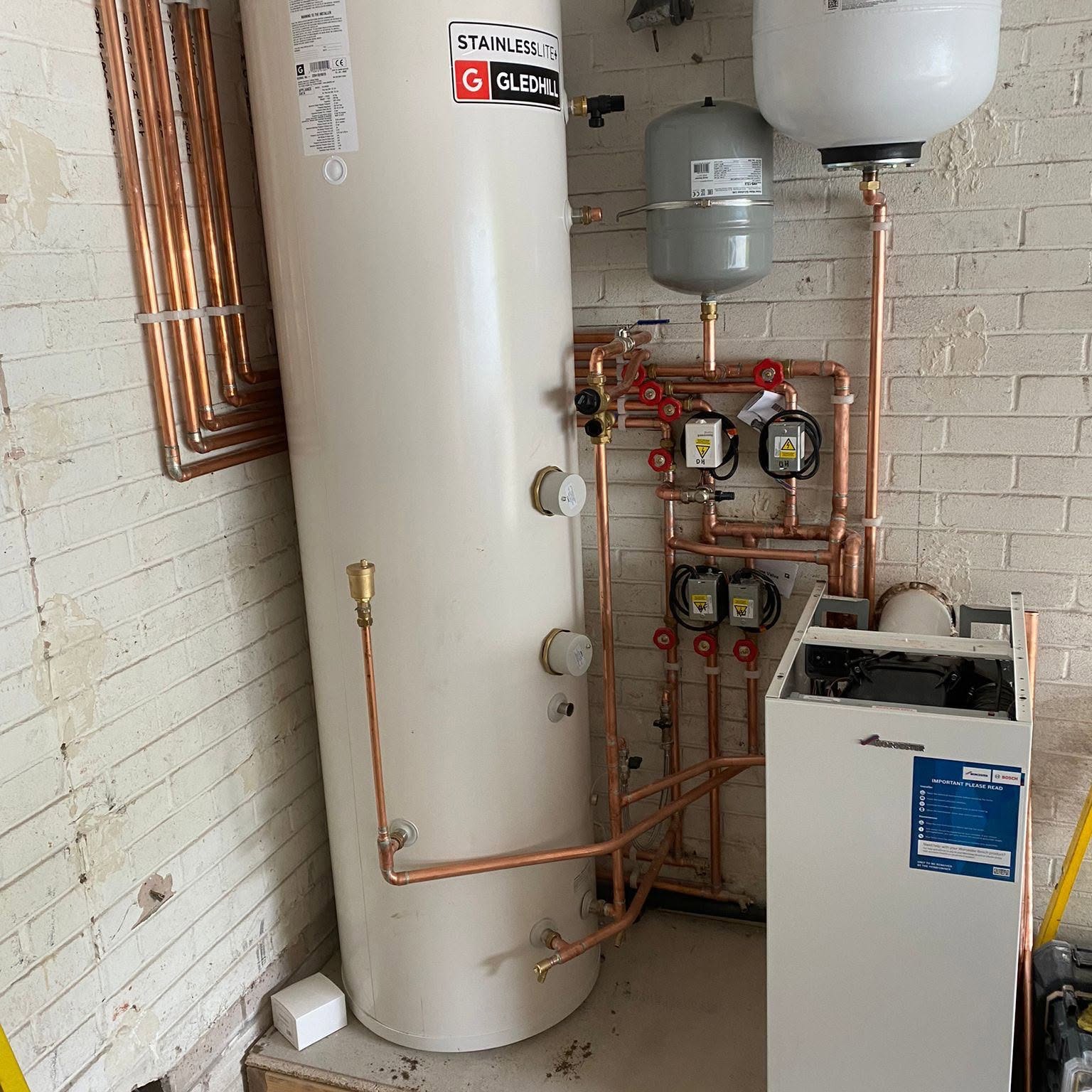 Gledhill Stainlesslite cylinder paired with a Worcester system boiler installed in Greater Manchester