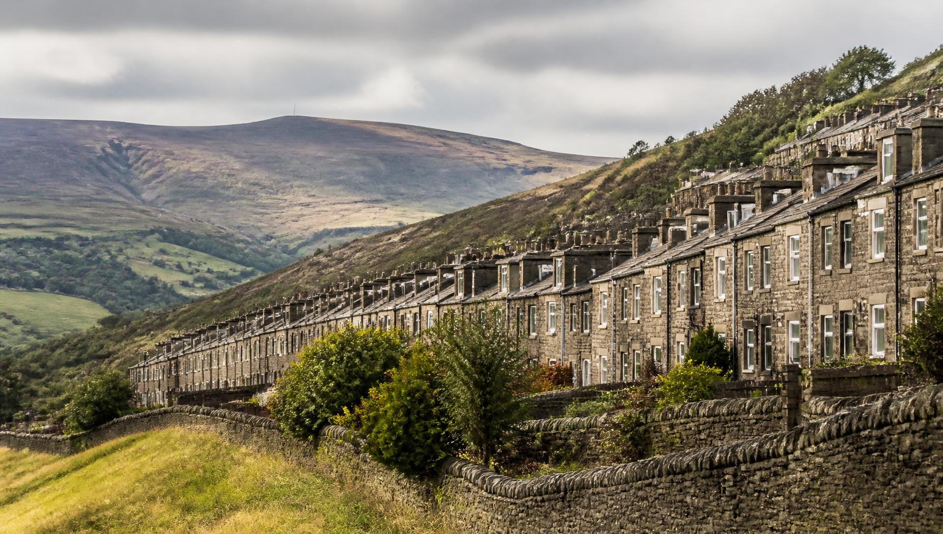 Stone workers cottages climbing the hillside in Shaw and Crompton
